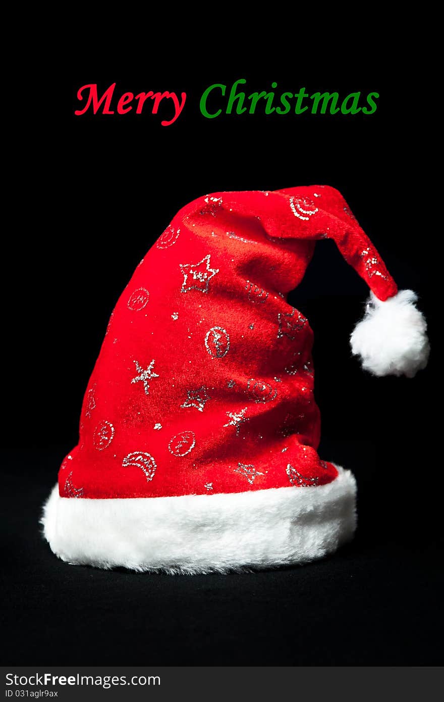 Red Christmas cap with shiny silver ornaments