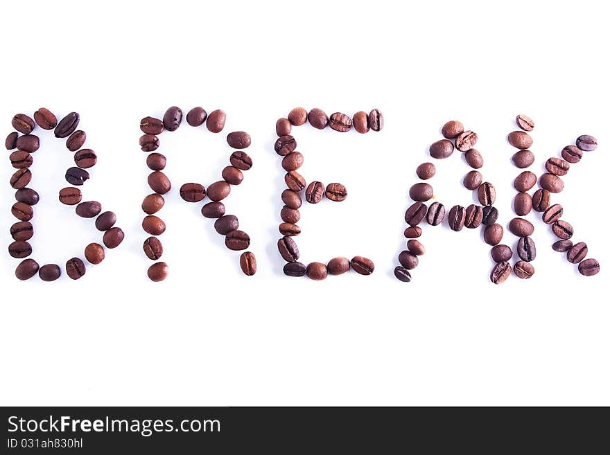 Break written with coffee beans on white background. Break written with coffee beans on white background.