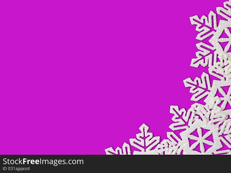 Purple Background with Snowflakes in Border. Space for Text