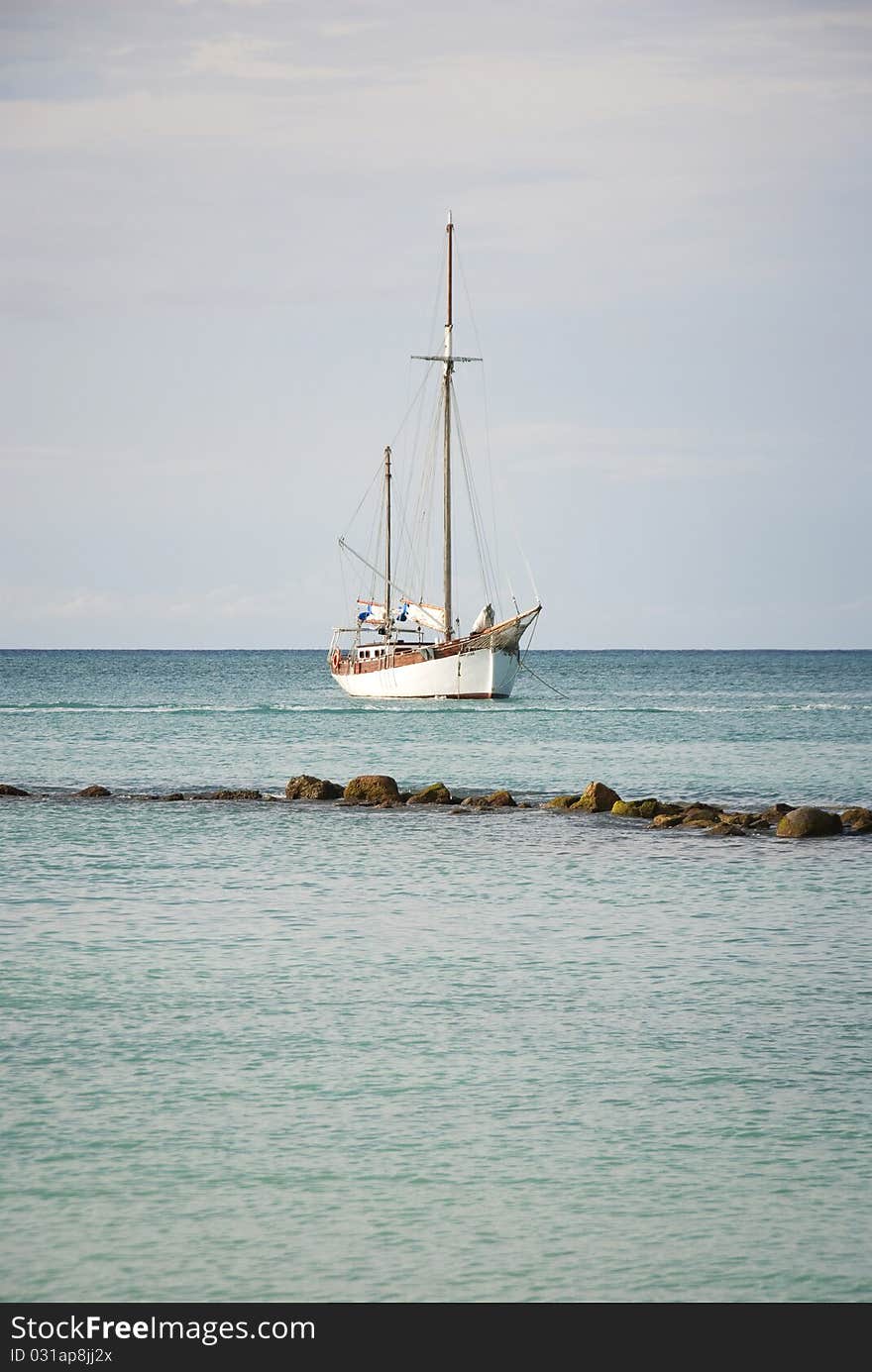 Sailboat Anchored Off Shore