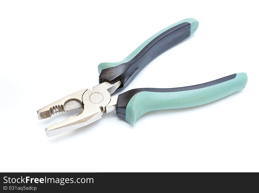 Isolated green pliers on white background