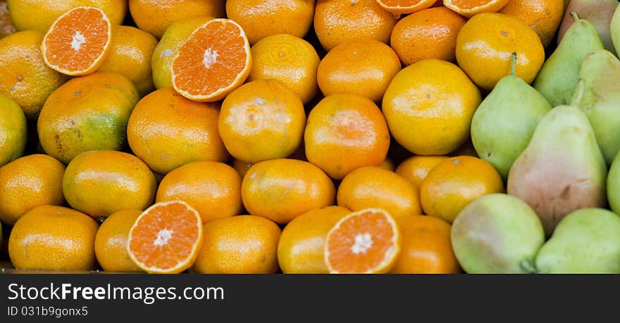 Oranges and pears for sale at farmers market in Spain. Oranges and pears for sale at farmers market in Spain