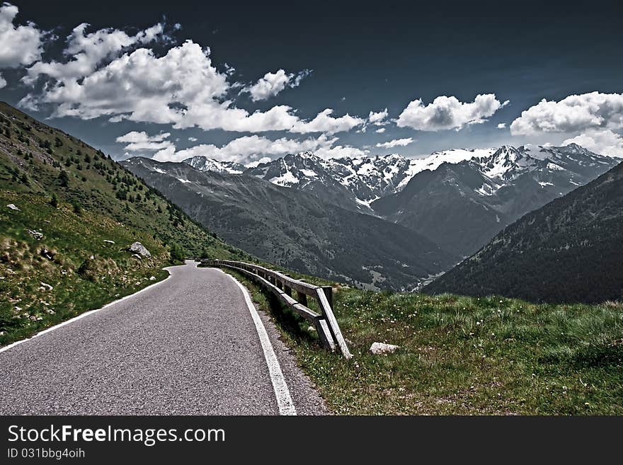 The Gavia Pass in Italy. Empty road vista in the Italian Alps.