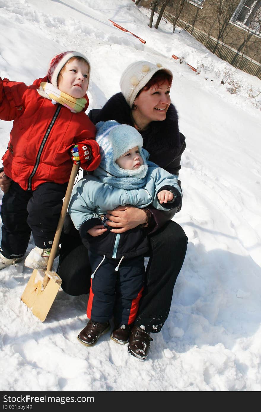 Winter walk of a family