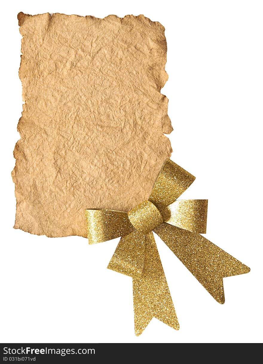 Empty vintage paper and golden bow