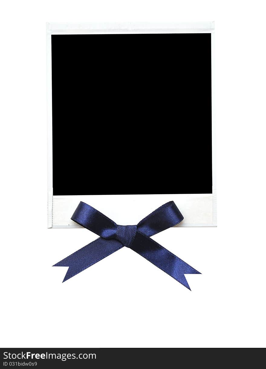 Old photo with blue bow isolated on a white background.