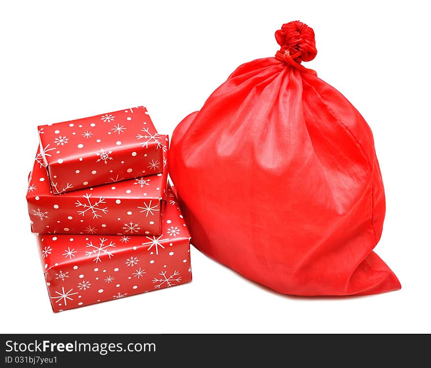 Christmas gift box and red bag on white on white. Christmas gift box and red bag on white on white