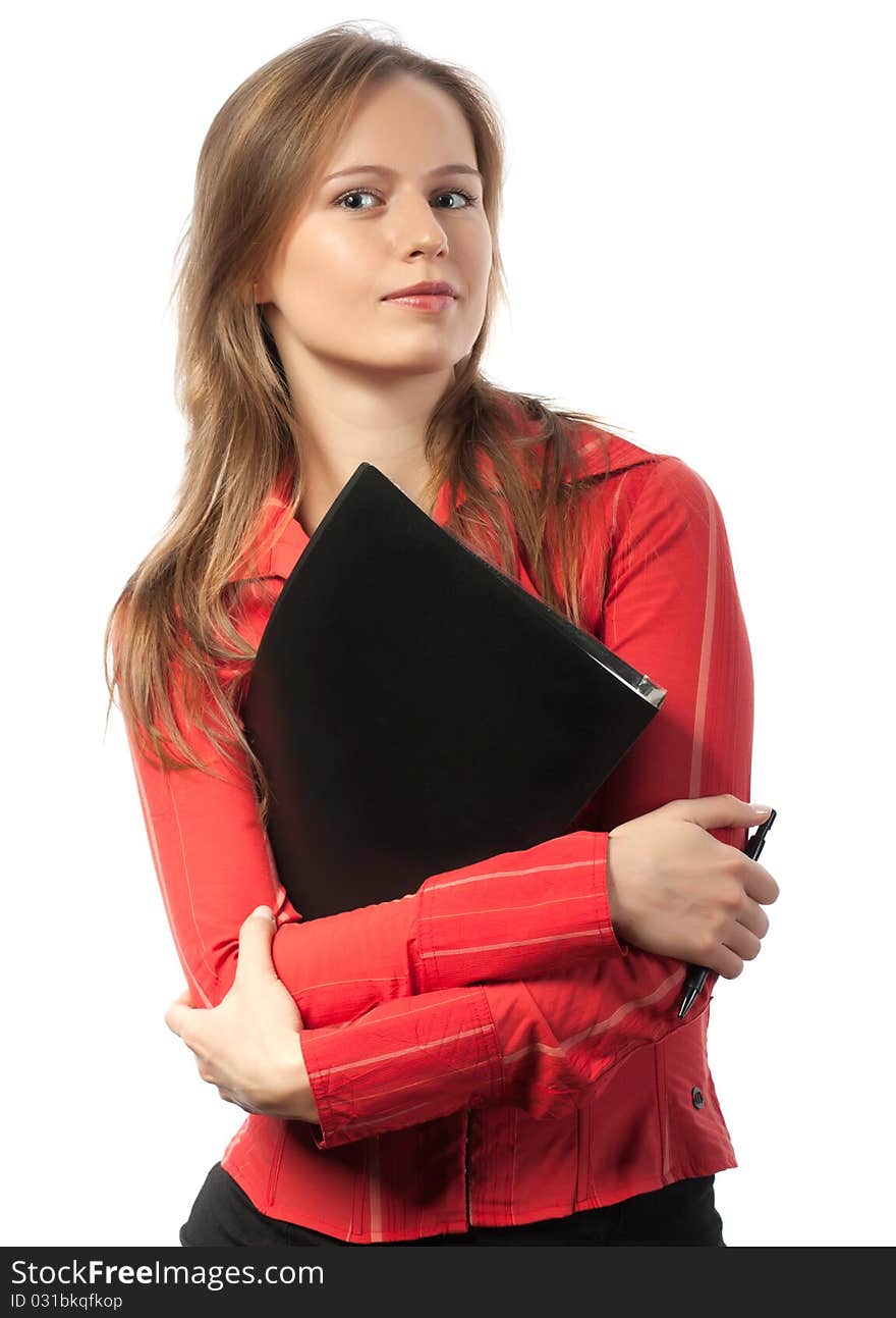 Confident businesswoman standing and holding folder and pen