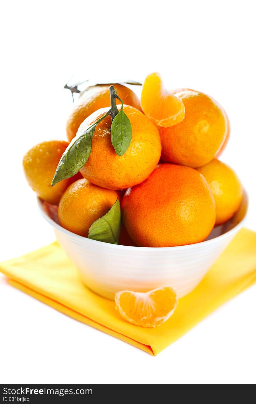 Mandarin in bowl on white isolated background. Mandarin in bowl on white isolated background