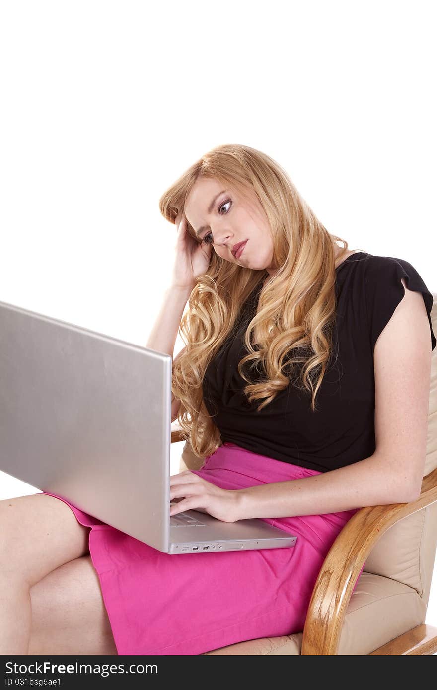 A woman taking a break from her laptop after working for so long. A woman taking a break from her laptop after working for so long.