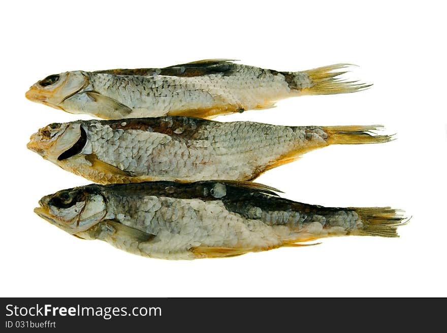 Three salted and dried big fishes (on a white background). Three salted and dried big fishes (on a white background)