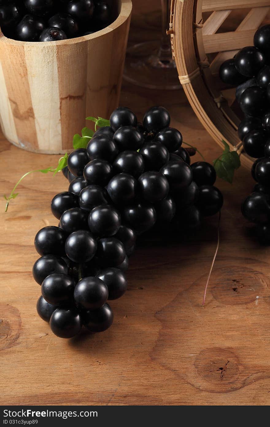 A set up of grapes with mood lighting