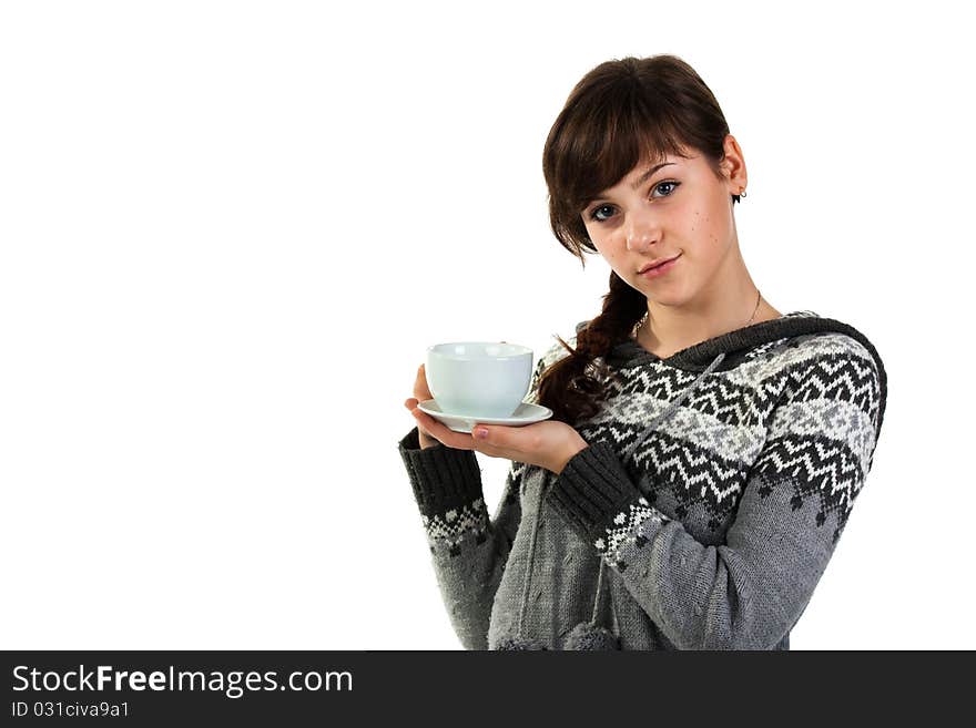 Beautiful girl holding a cup of tea isolated on white