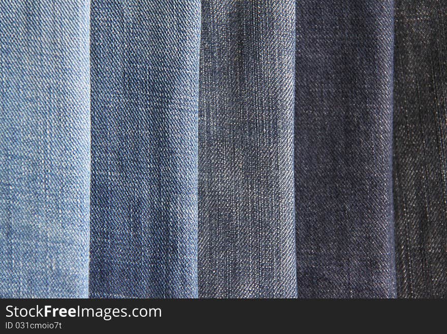 Texture of blue jeans as a background