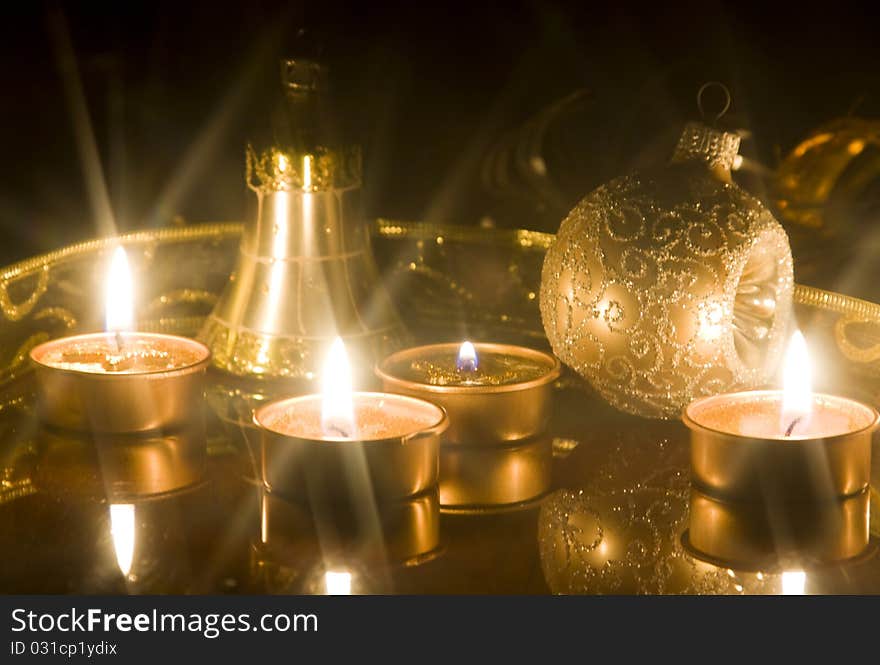 Christmas decorations and star shaped candles burning