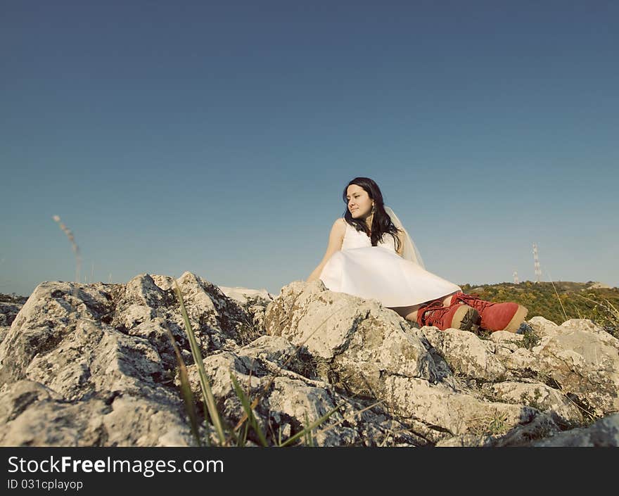 Romantic woman with red boots