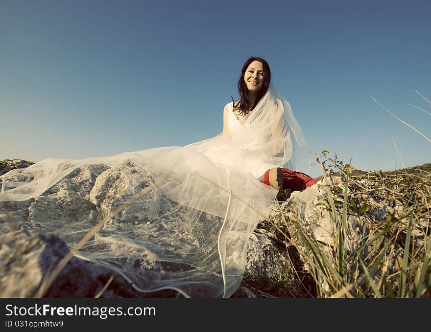 Romantic woman with red boots