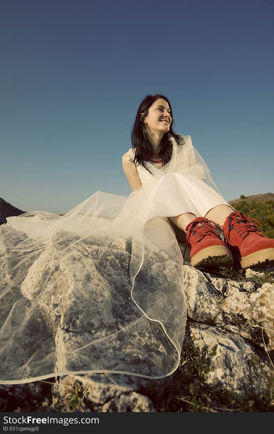 Romantic woman with red boots