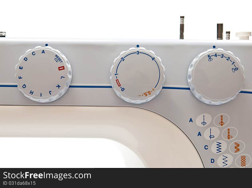 Details of sewing machine on white background. Details of sewing machine on white background