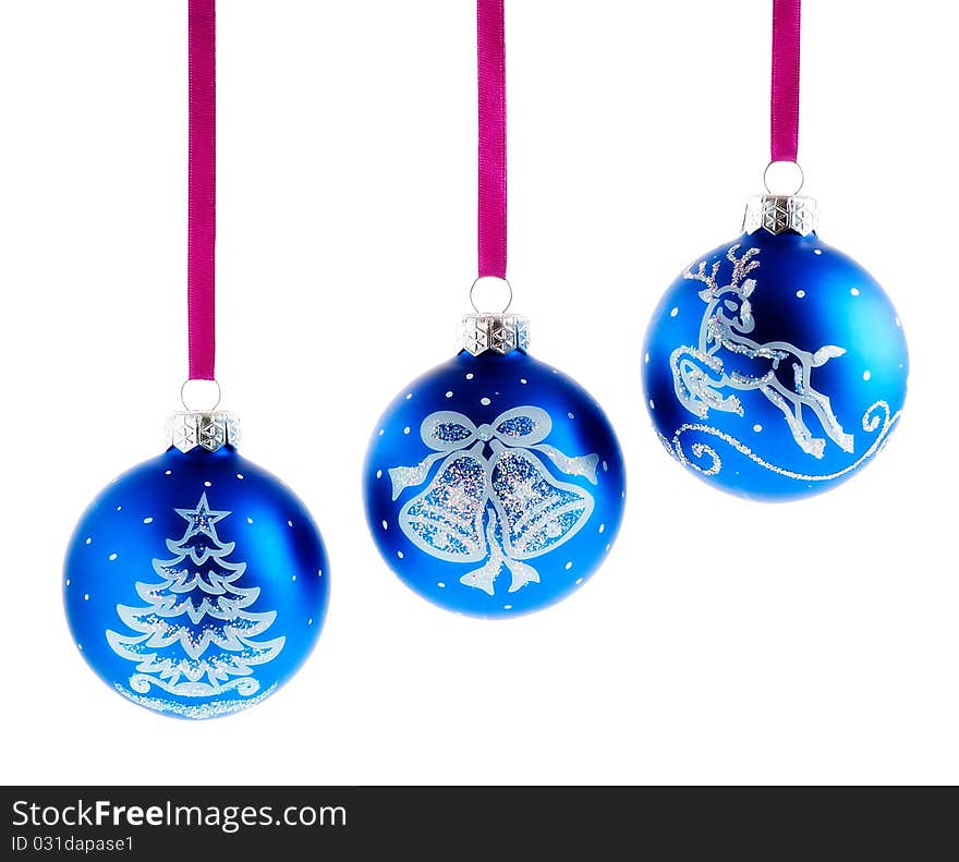 Christmas balls hanging with ribbons on white background