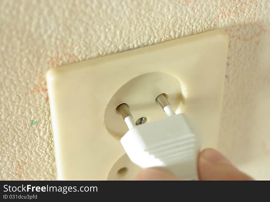 White two-pin plug