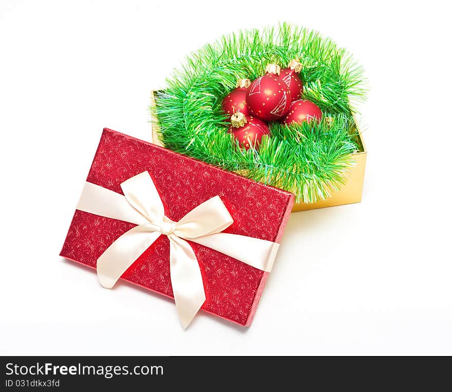 Red Gift box with baubles and tinsel