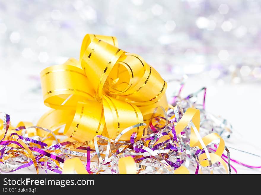 Yellow Christmas ribbon on white background