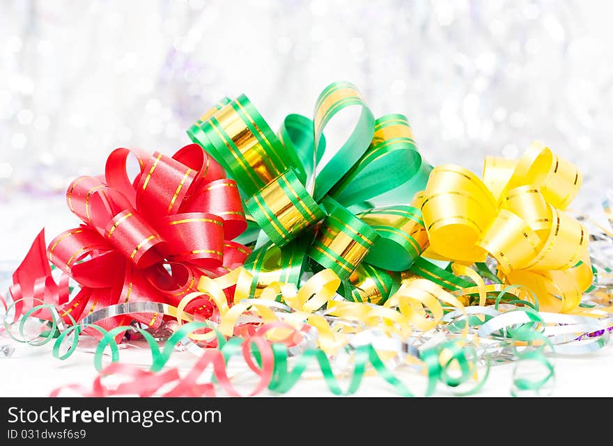 Christmas bright background with color ribbons. Christmas bright background with color ribbons