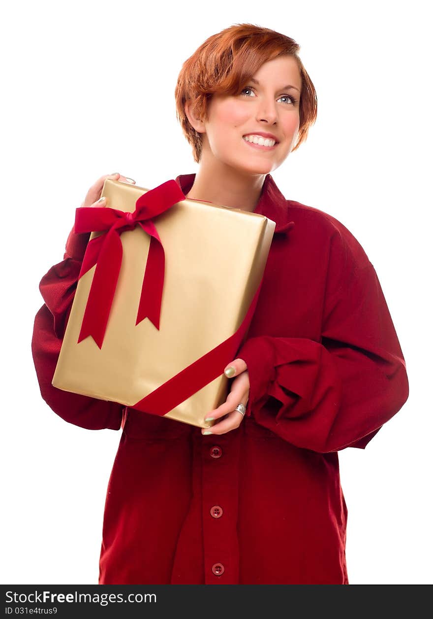 Pretty Red Haired Girl with Wrapped Gift Isolated on a White Background.