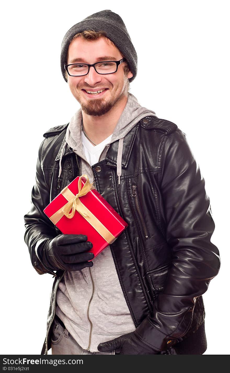 Warmly Dressed Handsome Young Adult Holding Gift