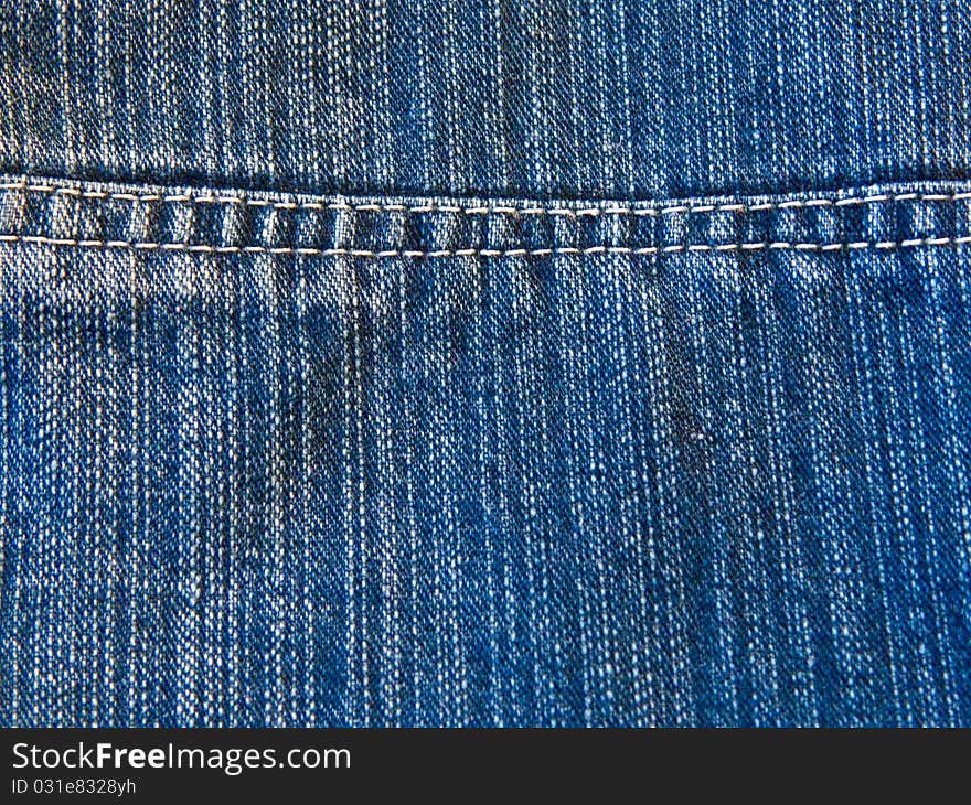 Rough seam on a blue denim