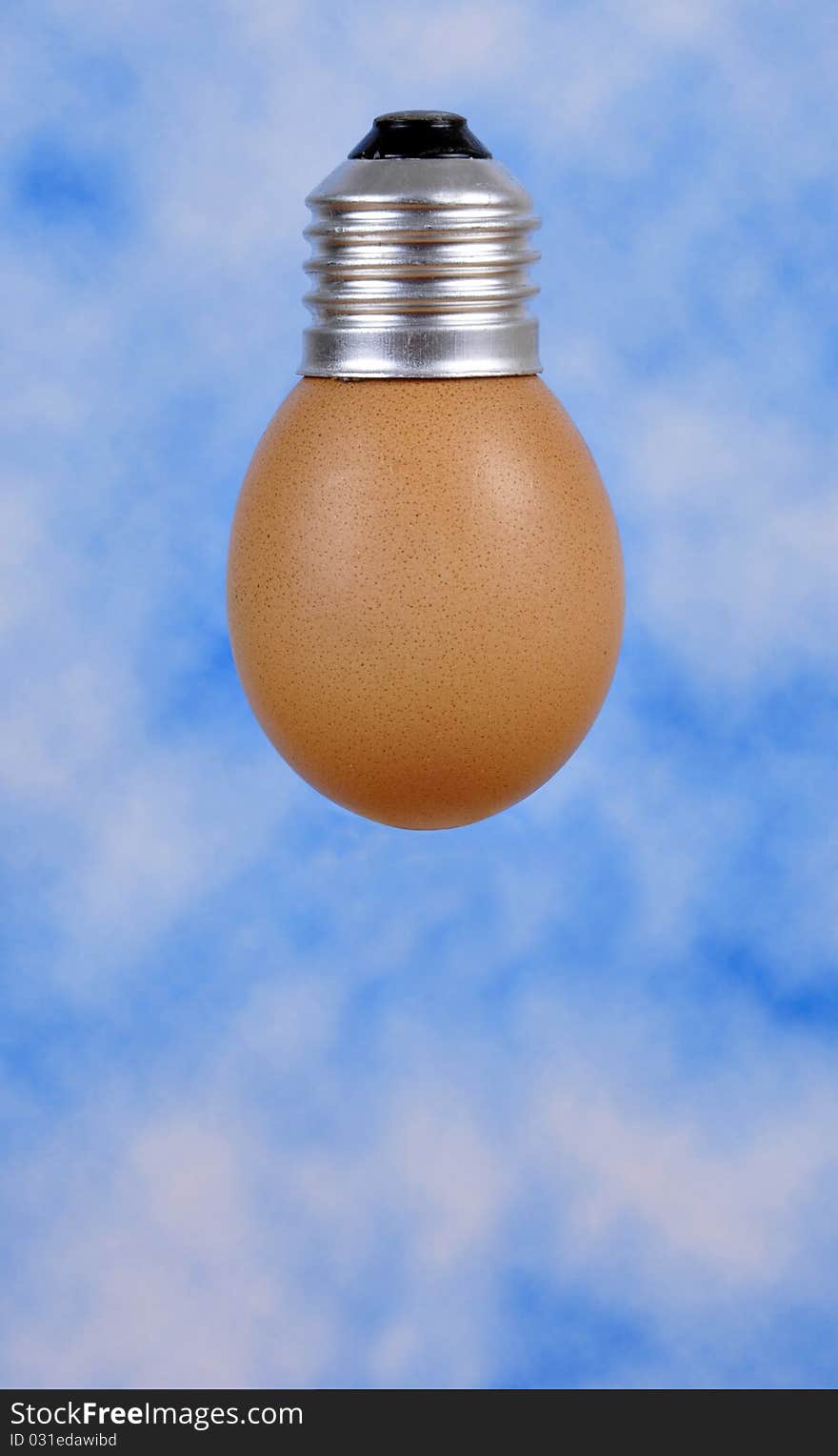 An egg as a bulb, against the clear blue sky. An egg as a bulb, against the clear blue sky.