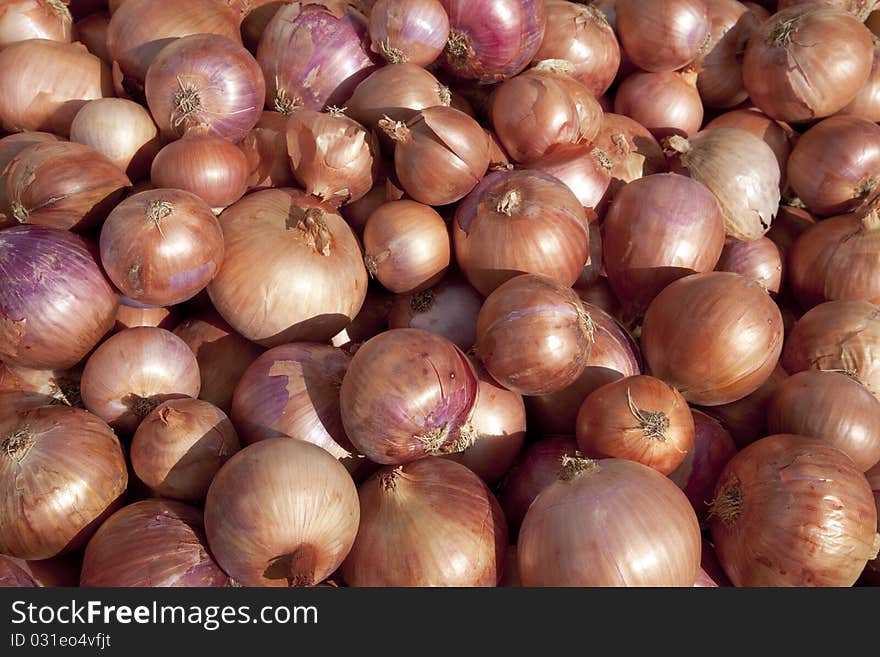 Onions on the counter of the vegetable market