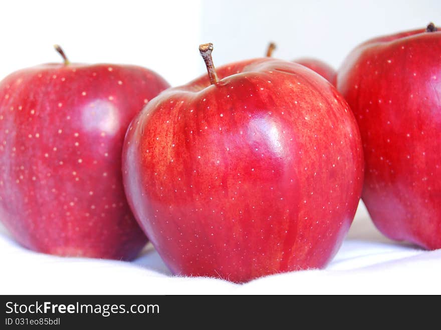 Red apples on white background top view. Red apples on white background top view