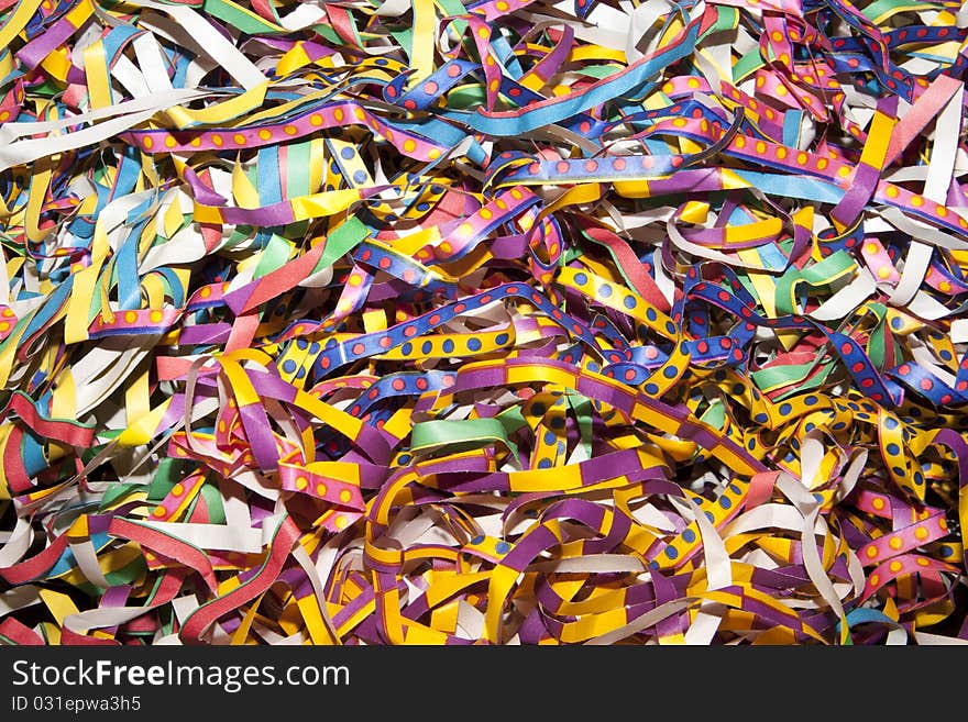 Many colored streamers on a table. Many colored streamers on a table