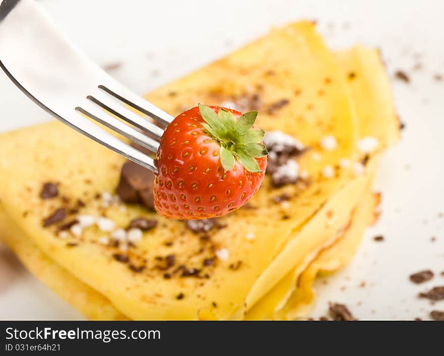 Crepes with choccolate and strawberries