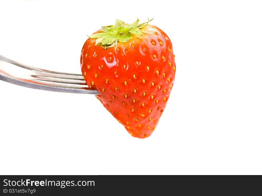 Photo of strawberries on green foils putted on white isolated background. Photo of strawberries on green foils putted on white isolated background