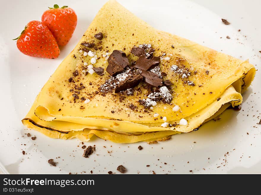 Crepes with choccolate and strawberries