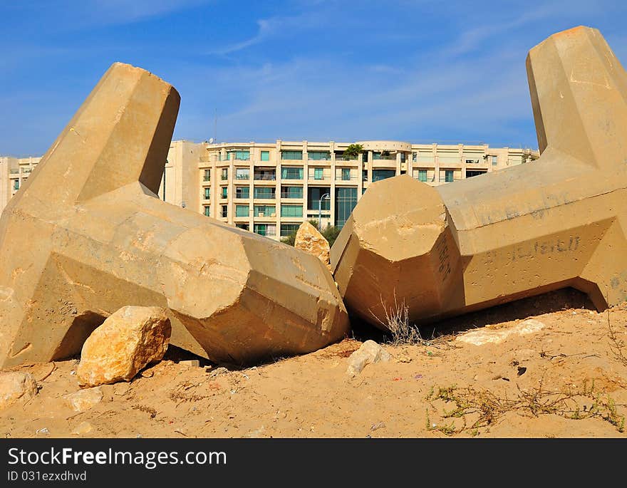 Decorative stone anchors at the seashore. Decorative stone anchors at the seashore.