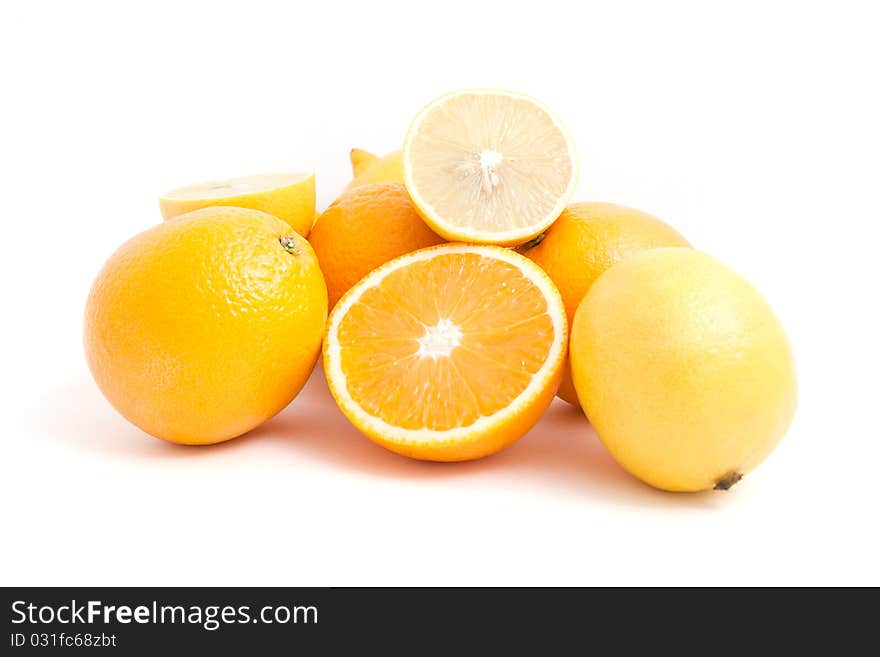 Group cut lemon and orange isolated on white background. Group cut lemon and orange isolated on white background