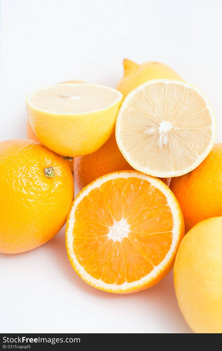 Group cut lemon and orange isolated on white background. Group cut lemon and orange isolated on white background