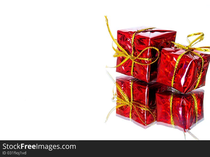 Red gift boxes with reflection. Red gift boxes with reflection