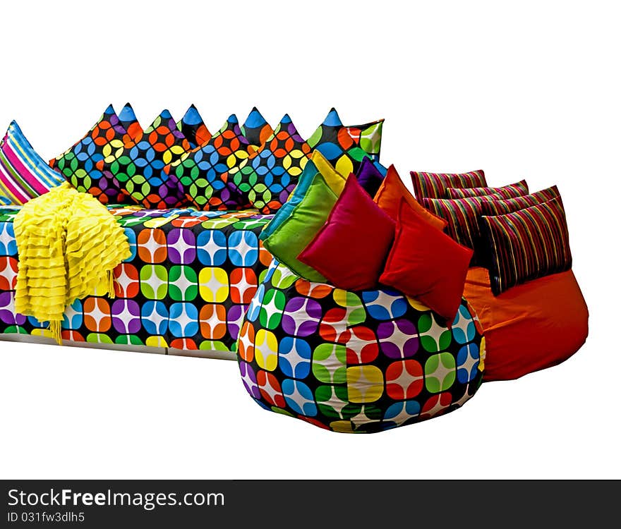 Many-coloured pillows on the white bakground