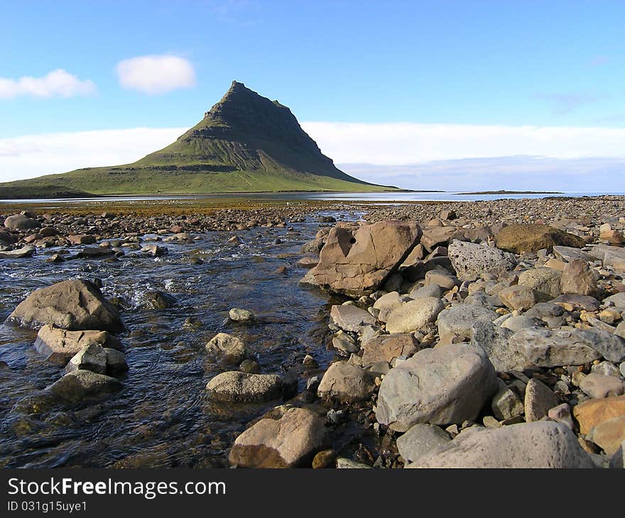 A mountain by the ocean