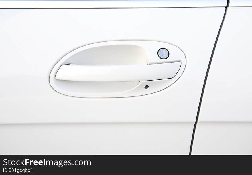 White door of a car with handle. White door of a car with handle