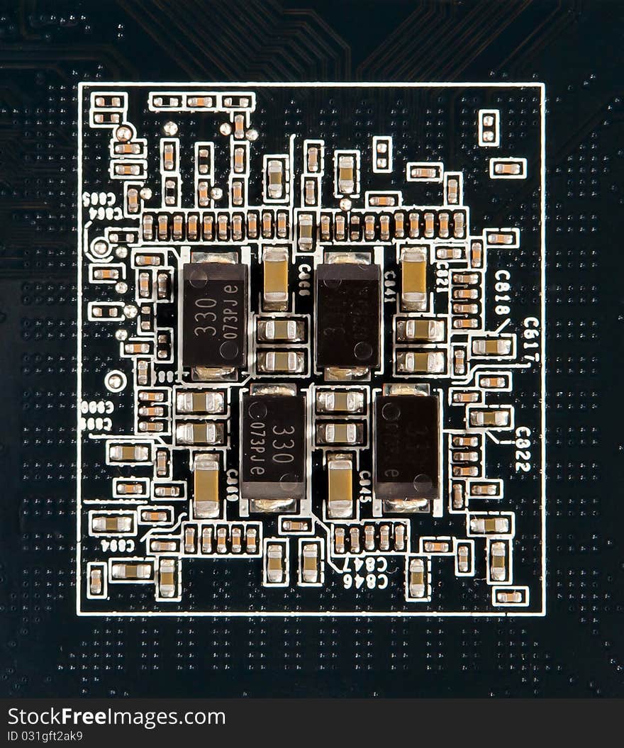 Small semiconductor components on a black background. Small semiconductor components on a black background