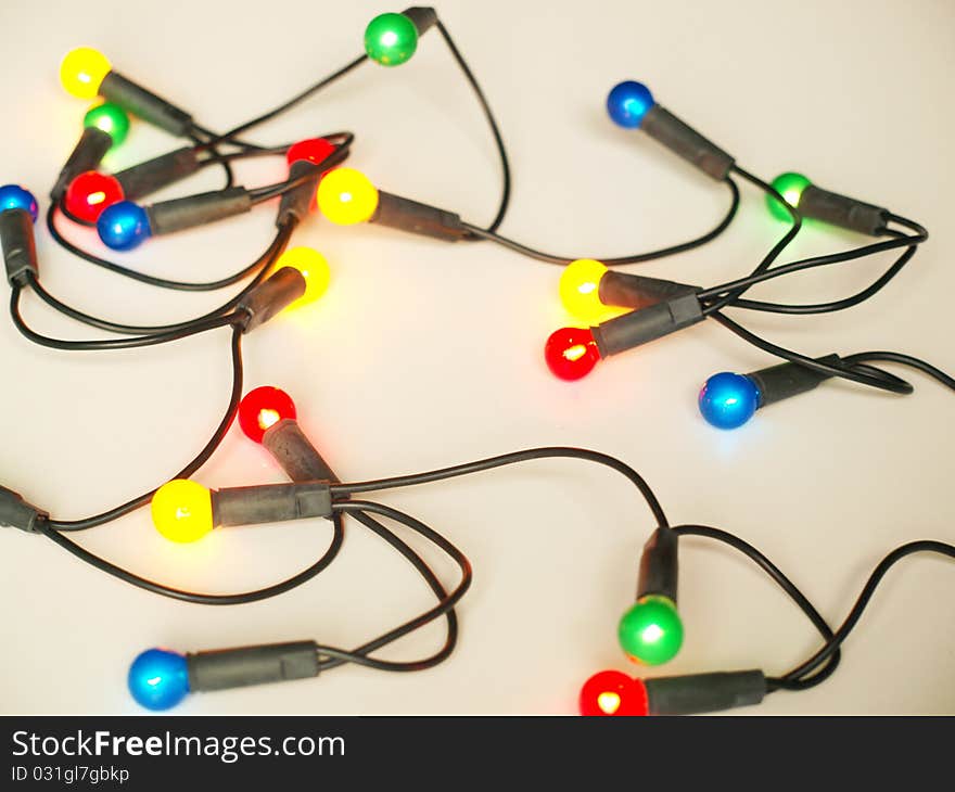 Colorful Christmas bulbs on a white background