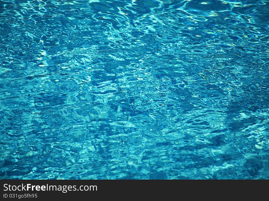 Swimming pool water reflections. Daylight. Swimming pool water reflections. Daylight.