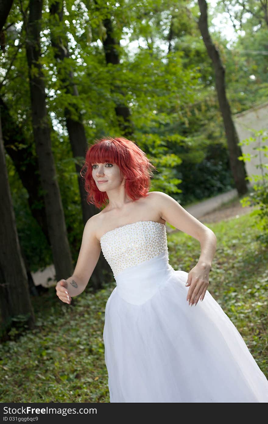 Pretty woman posing in forest. Pretty woman posing in forest