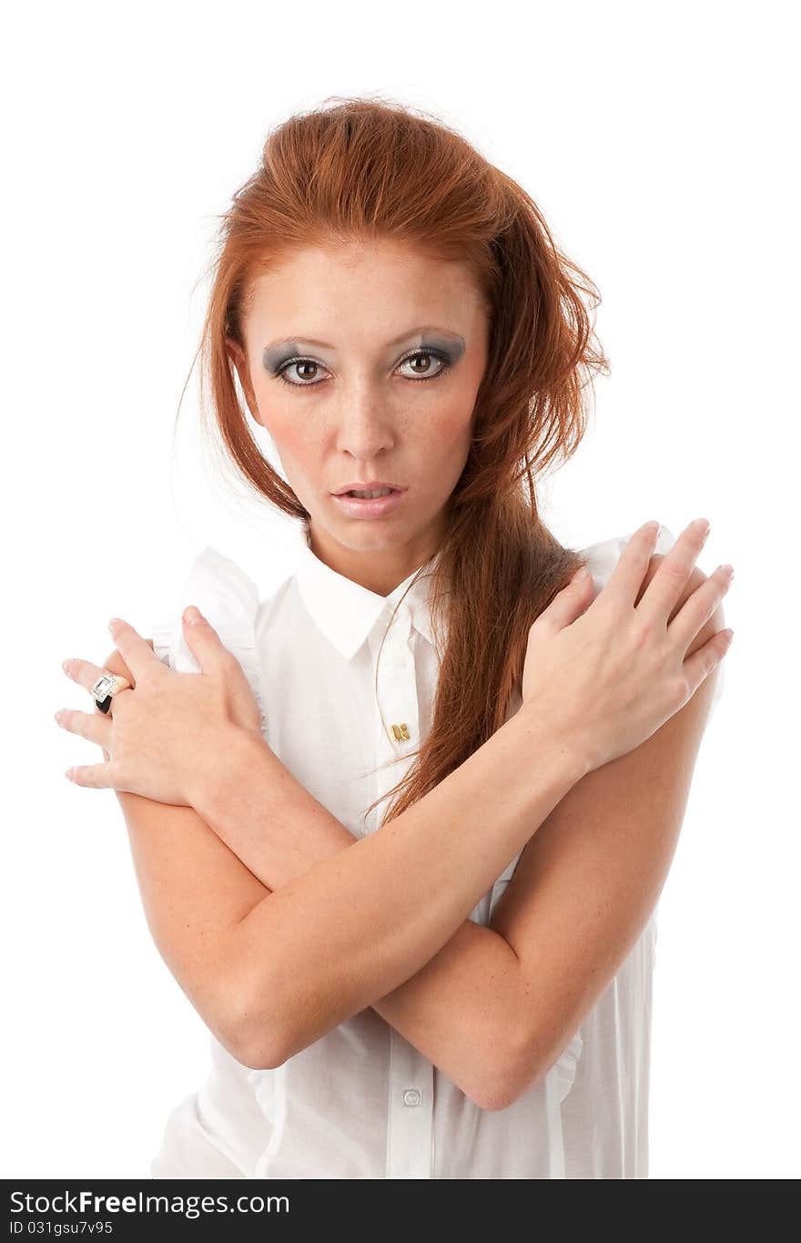 Young redhead woman on a white background